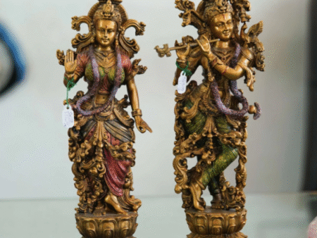 Man Playing Flute and Woman Holding Flower