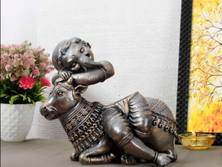 Handcrafted Brass Cow Statue with Ganesha Relief